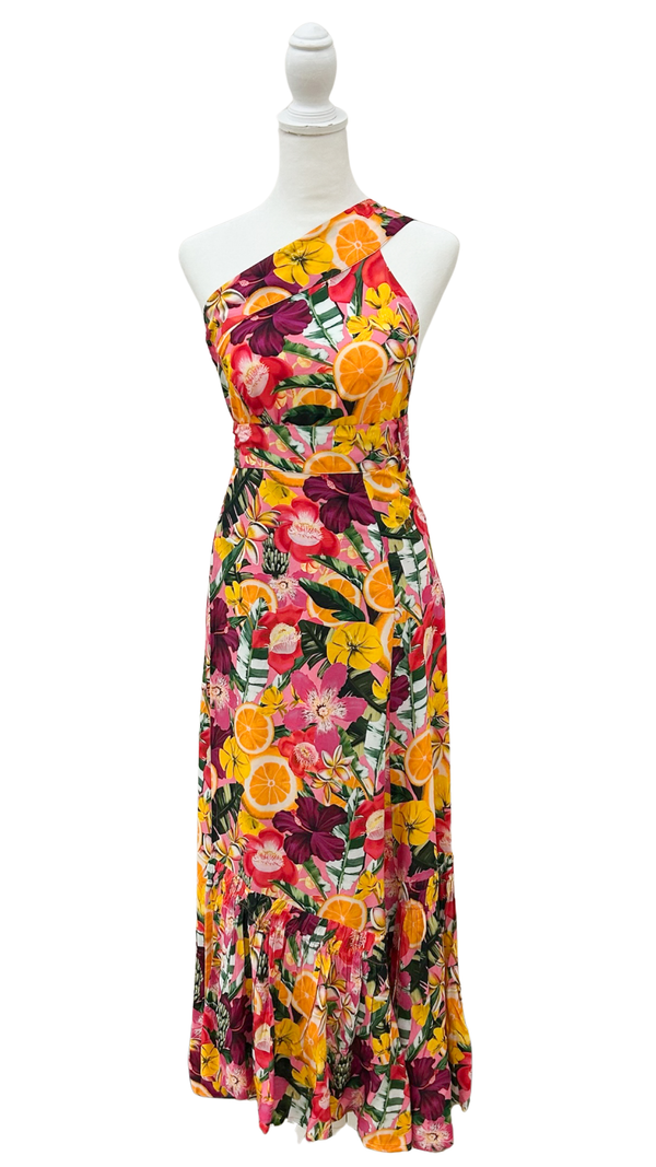 A one-shoulder maxi dress with a vibrant, dense floral print featuring yellow, pink, red, and orange flowers with green leaves on a white mannequin torso.