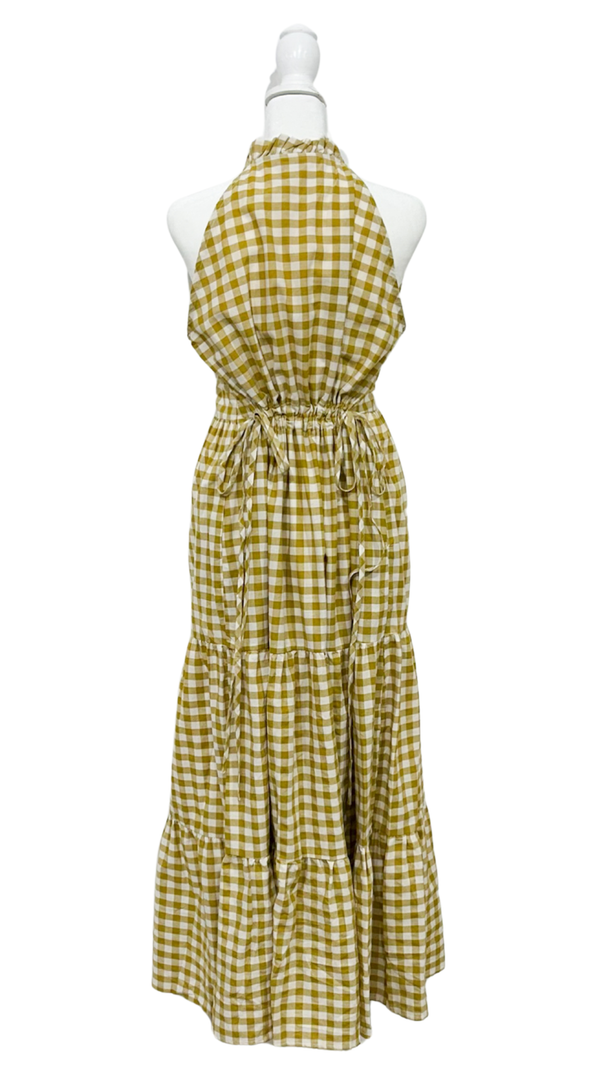 Yellow checkered halter neck dress on a mannequin against a white background
