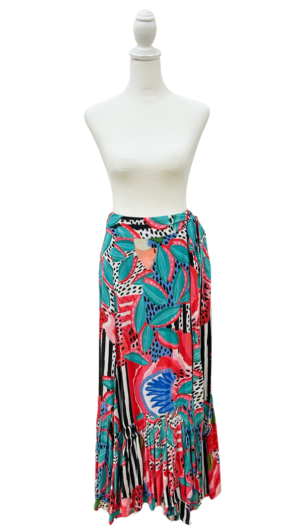 Colorful patterned skirt on a mannequin against a white background