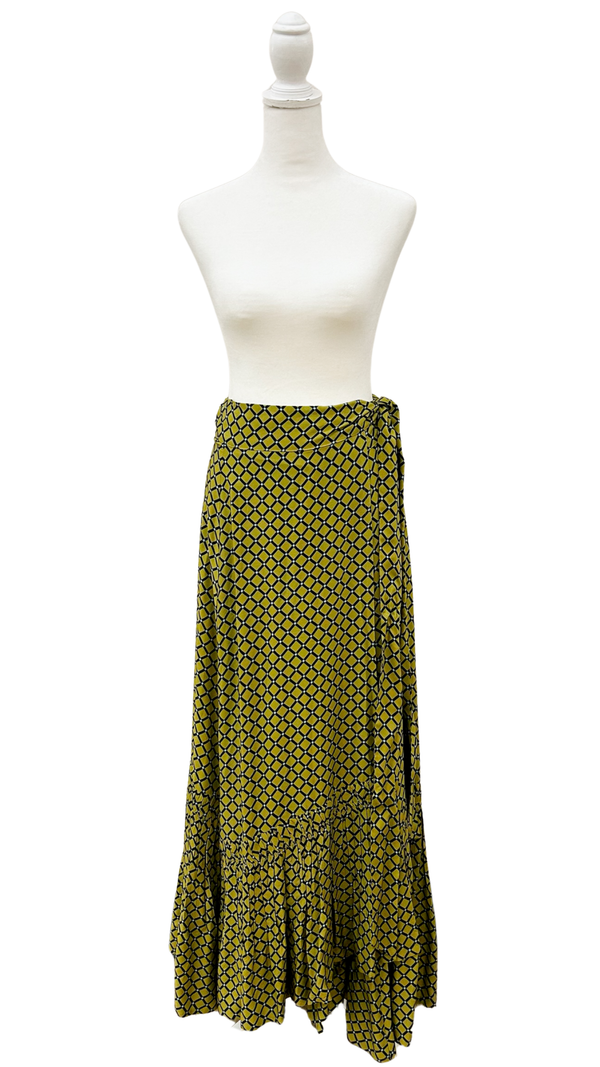 Green patterned skirt on a mannequin against a white background