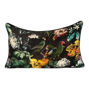 Decorative pillow with floral and parrot design on a black background