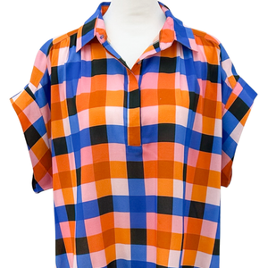 Plaid shirt on a mannequin against a white background