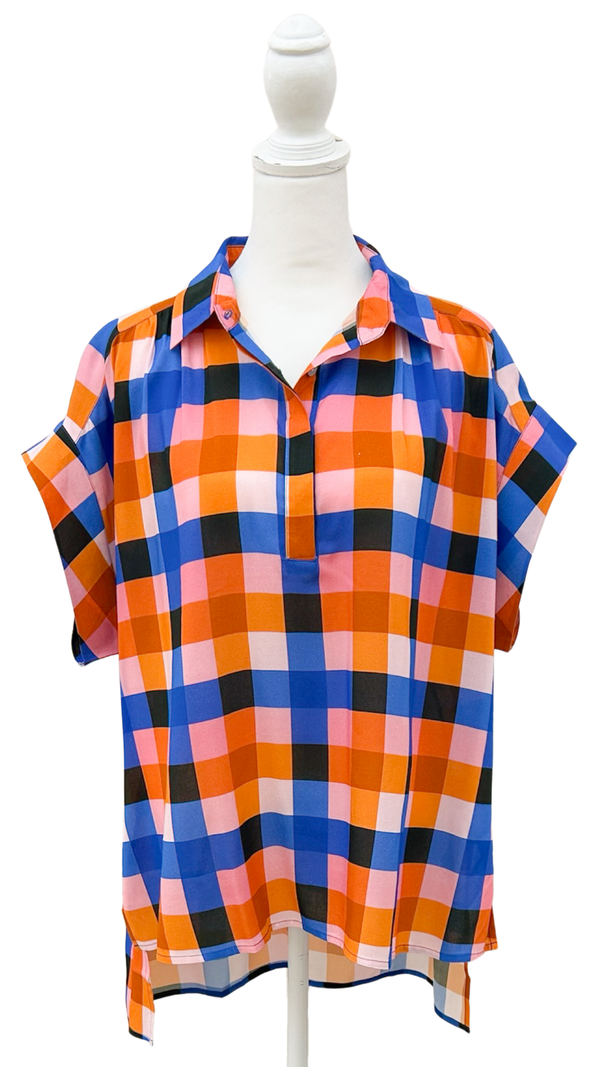 Plaid shirt on a mannequin against a white background