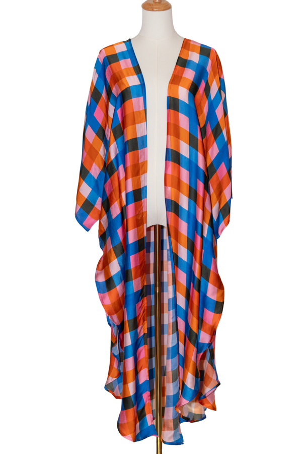 Colorful checkered kimono-style garment on a mannequin against a white background