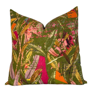 Decorative pillow with a colorful floral pattern on a white background