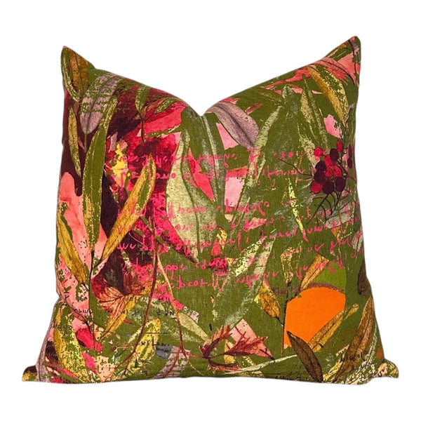 Decorative pillow with colorful leaf pattern on a white background