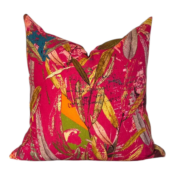 Colorful decorative pillow with abstract pattern on a white background