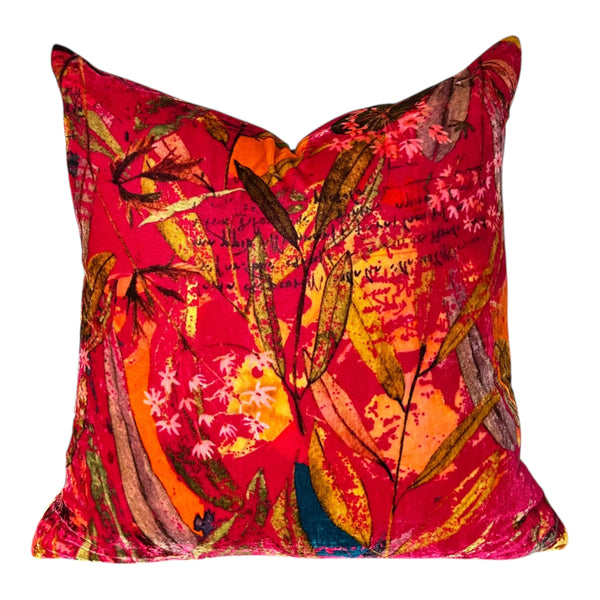 Colorful pillow with leaf pattern on a white background