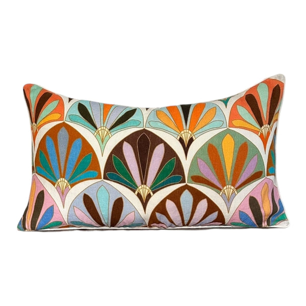 Decorative pillow with colorful geometric pattern on a white background