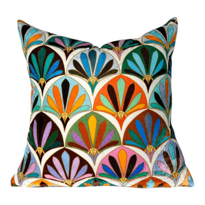Decorative pillow with a colorful geometric pattern on a white background
