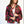 Woman wearing a colorful patterned jacket against a white background