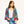 Woman wearing a colorful floral jacket and blue jeans on a white background