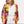 A woman with blonde hair is wearing a white button-up top and white pants, styled with a vibrant, multicolored tropical floral kimono jacket. She is standing against a plain white background.
