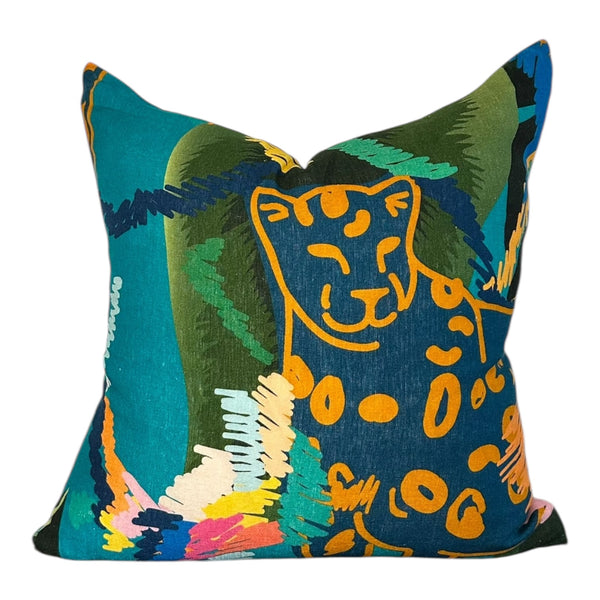 Decorative pillow with a colorful panther design on a white background