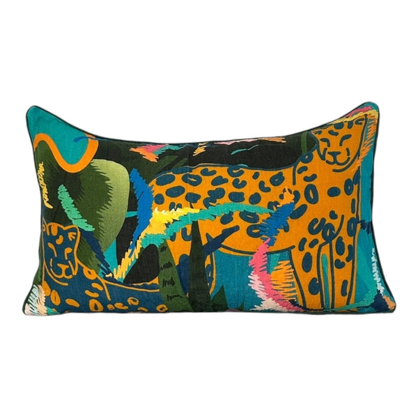 Colorful pillow with a leopard design on a white background