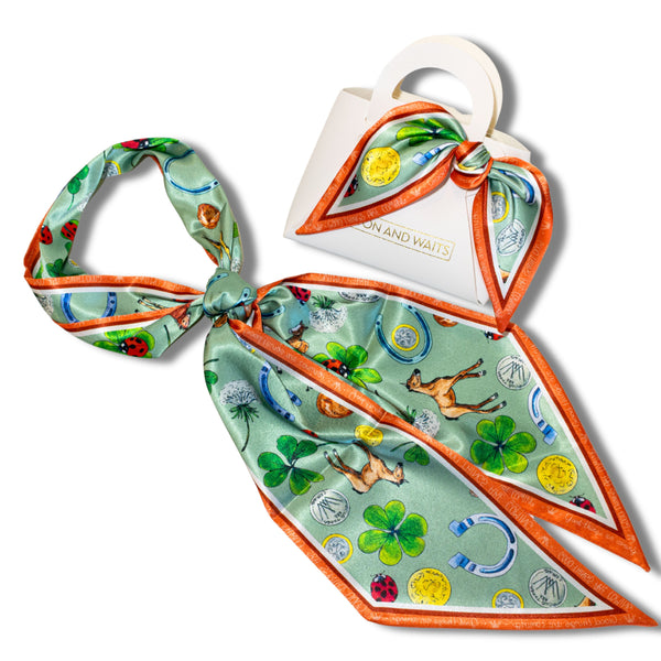 Decorative scarf with colorful pattern on a white background